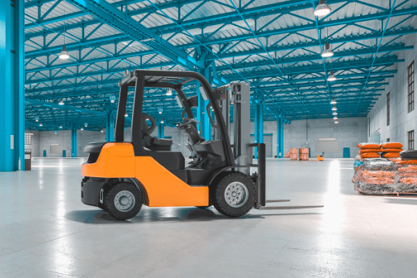A fork lift in a large warehouse