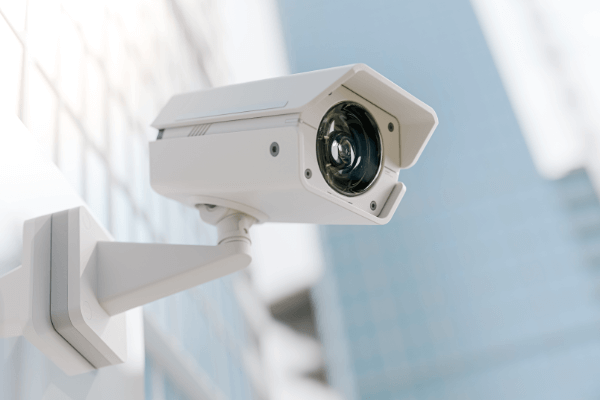 A white surveillance camera